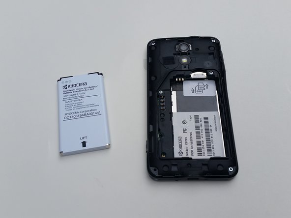 photo of inside of Kyocera phone with battery removed