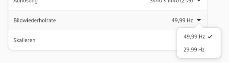 Gnome monitor settings with the refresh rate dropdown open, showing options 49,99 Hz and 29,99 Hz