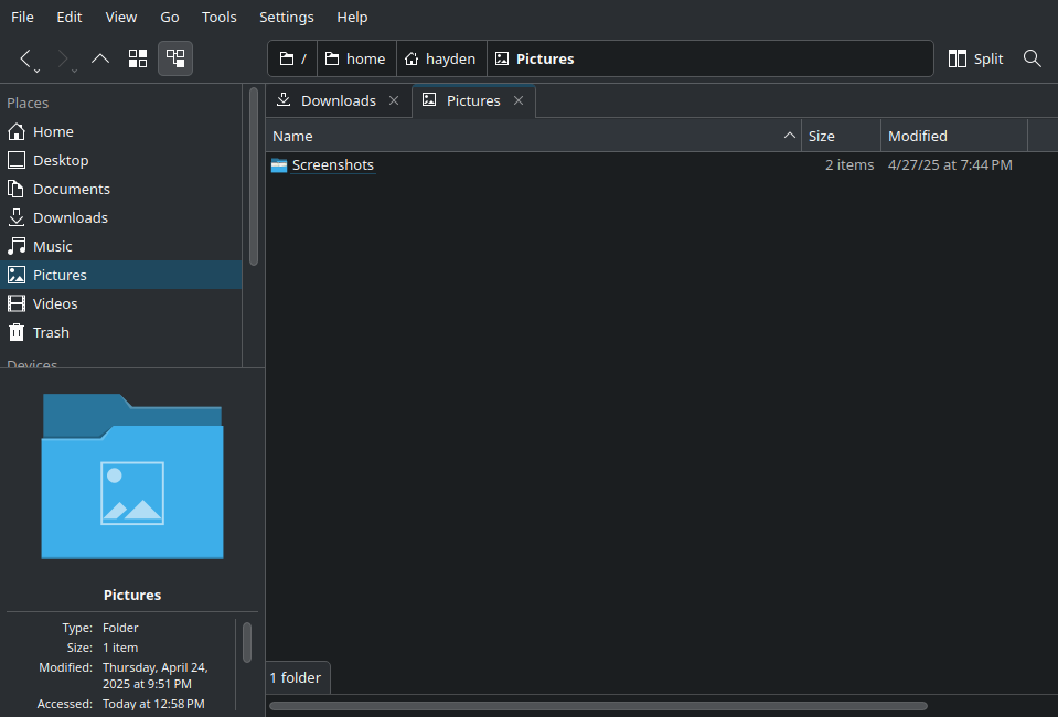 Screenshot of my pictures folder. I have just three columns (Name, Size, Modified). These all fit on screen and there's even some whitespace to the right of the Modified column, yet there is a horizontal scrollbar visible at the bottom of the window.