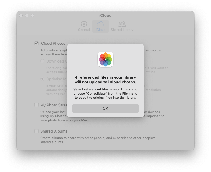 screenshot of Photos App settings with warning about referenced files