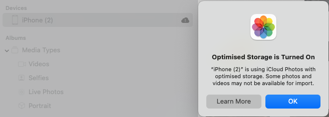 screenshot of Photos app with warning message